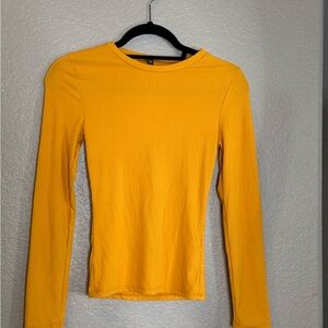 Express warm yellow ribbed long sleeve Knit Top. Great for layering!